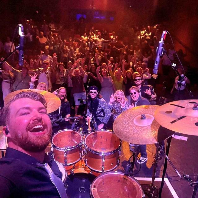 Good Times with Nile Rodgers and Chic performers with the Cornerstone crowd behind them