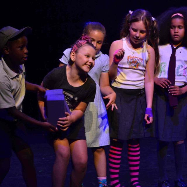 Children on stage as part of the 2024 Youth Theatre Showcase